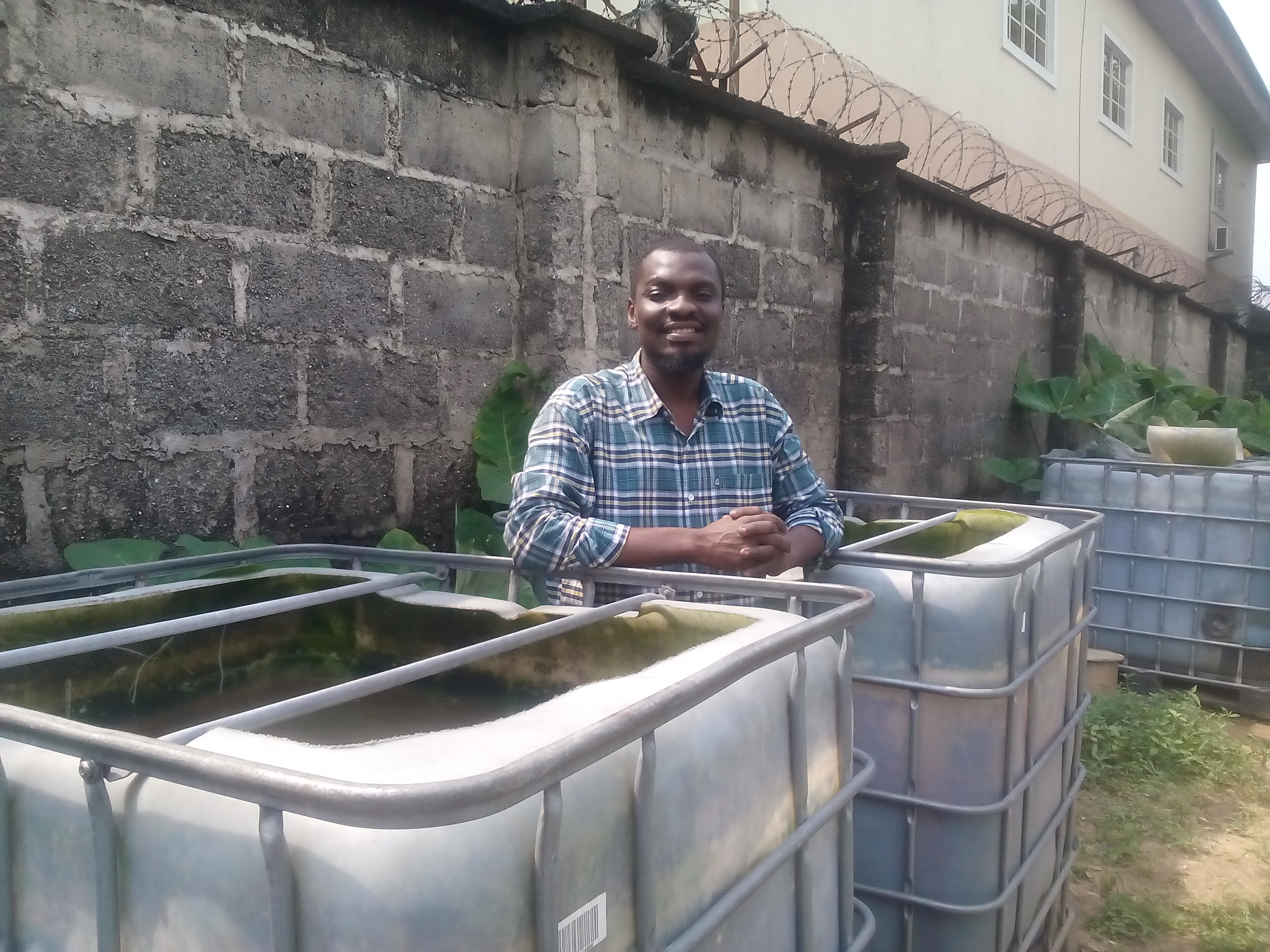 Chibuike on his fish farm in Port Harcourt.