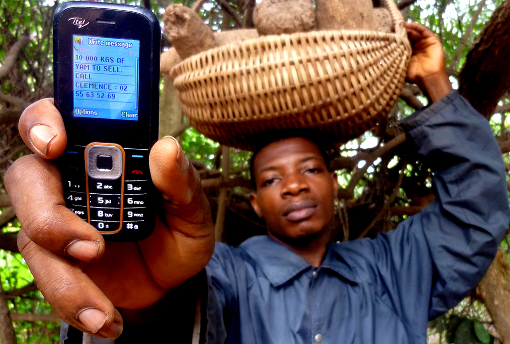 Farmer holding phone